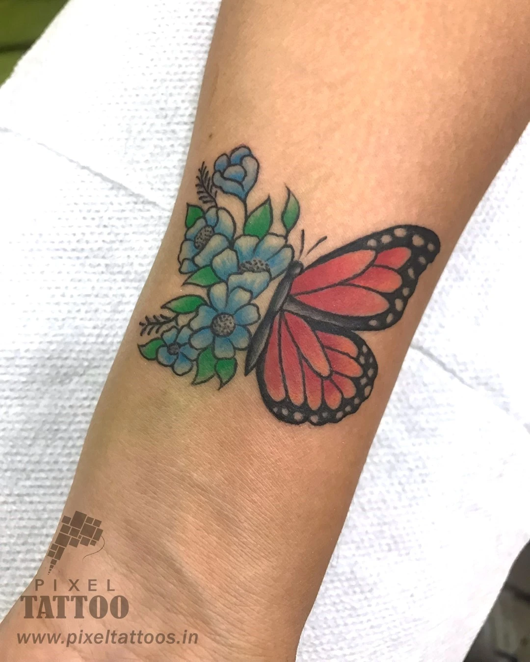 Color tattoo artwork in City Light Surat